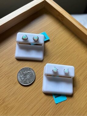 2 pairs of sterling silver opal earrings.